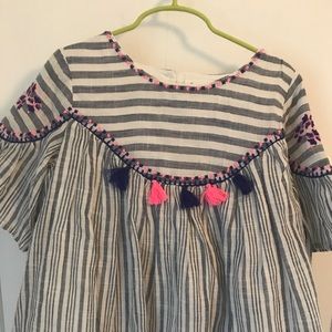 Very cute gently used Cat&Jack Pom Pom shirt.